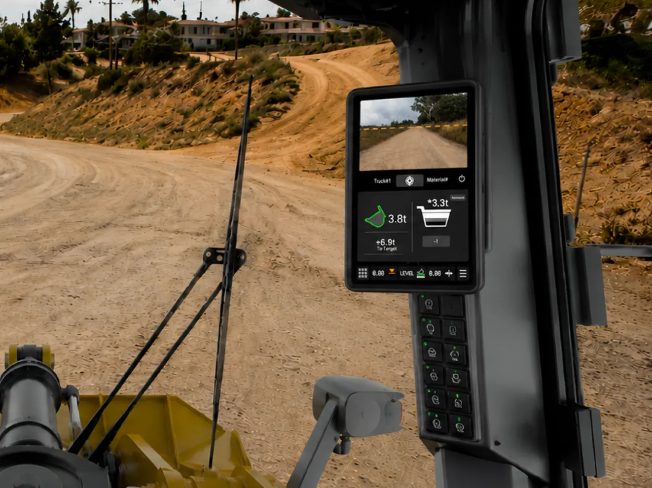The CPM display on the right pillar of a wheel-loader cab, away from the loading work on the left
